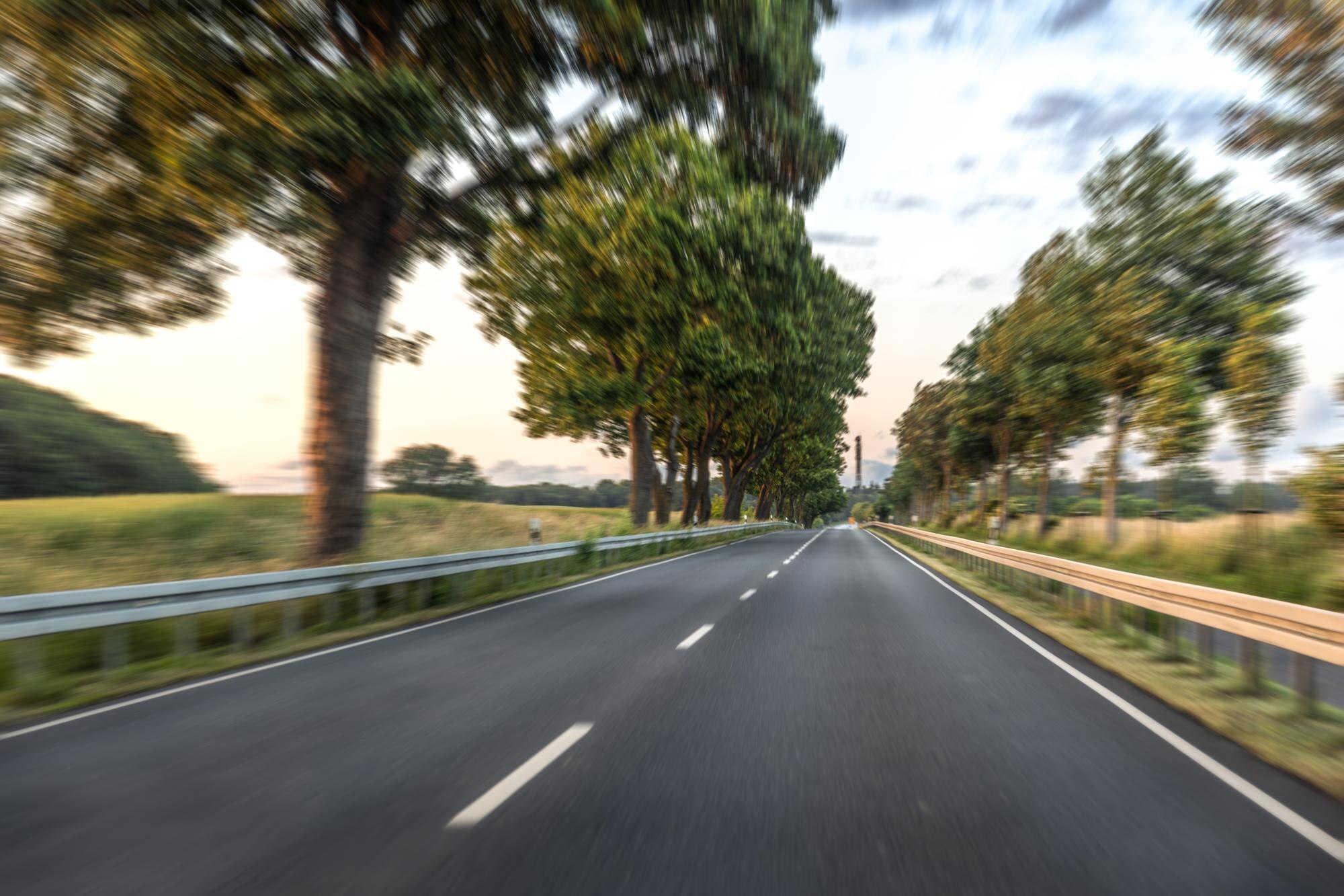 empty country road motion blur trees fast forward drive 169016 68679